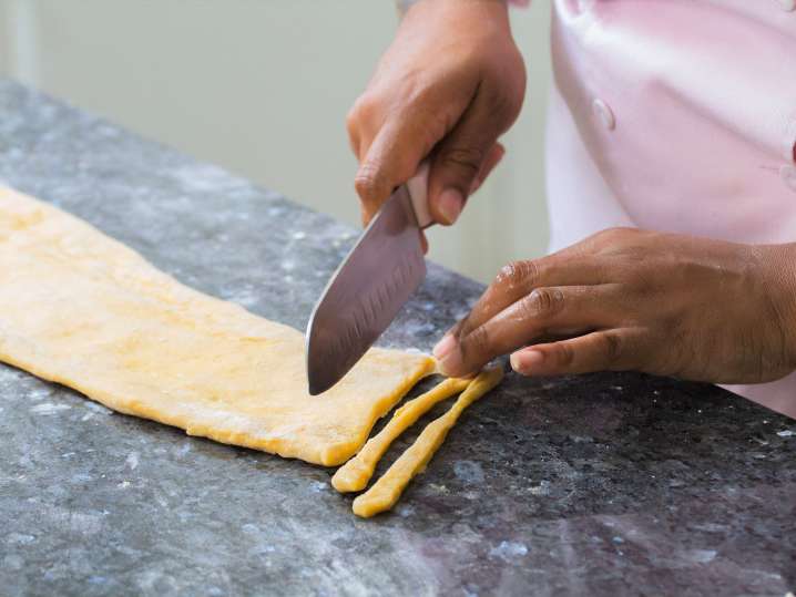fresh fettuccine on a floured work surface Shot