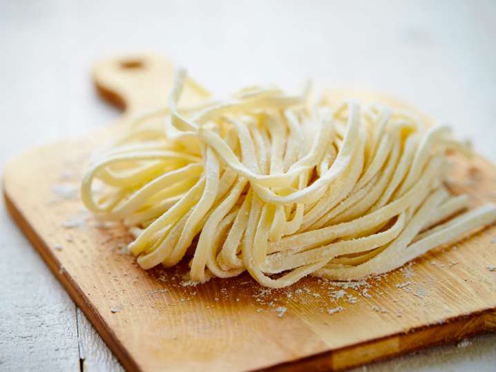 eggs and flour to make homemade pasta dough Shot