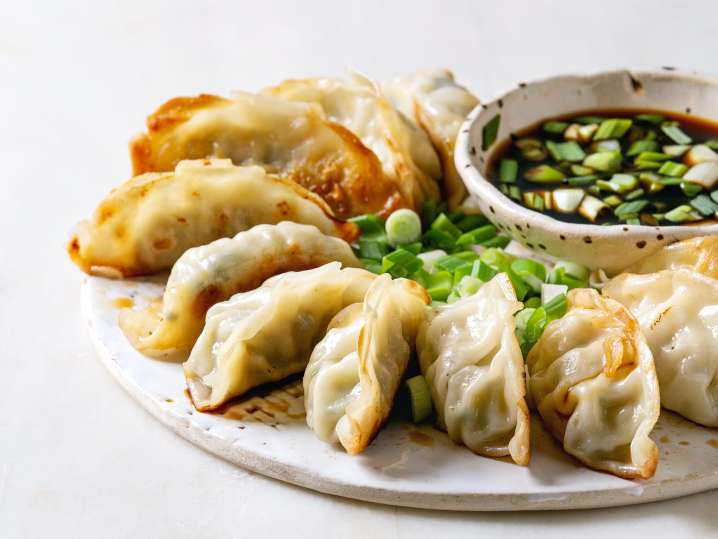 potstickers and dipping sauce Shot