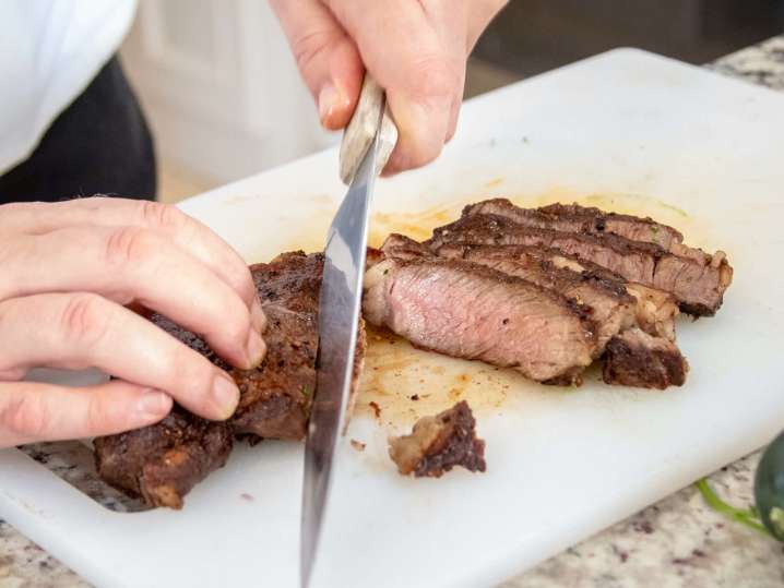 chef slicing ribeye steak for tacos | Classpop Shot