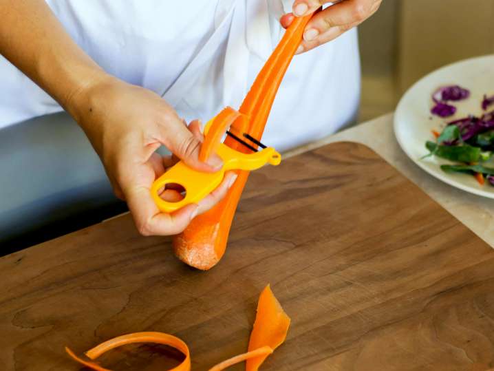 chef peeling carrots | Classpop Shot