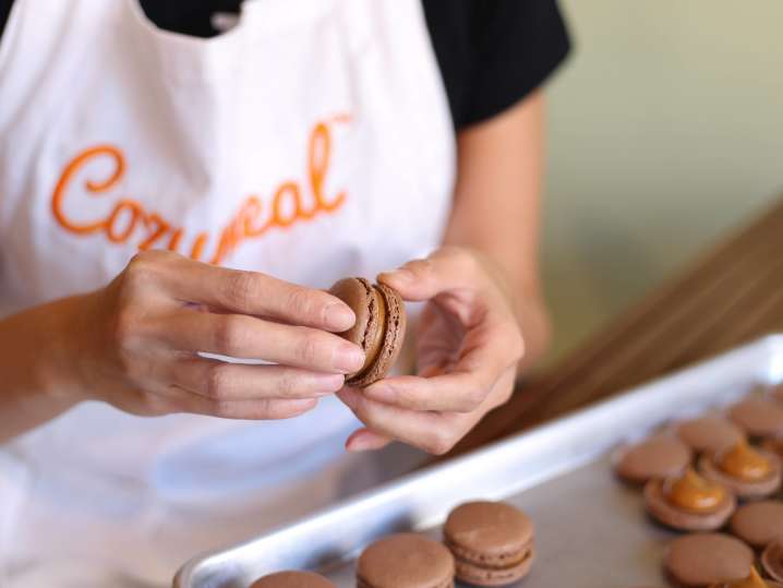 Chef making chocolate ganache macarons Cozymeal | Classpop Shot