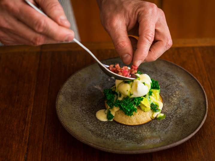 plating avocado and chard benedict | Classpop Shot