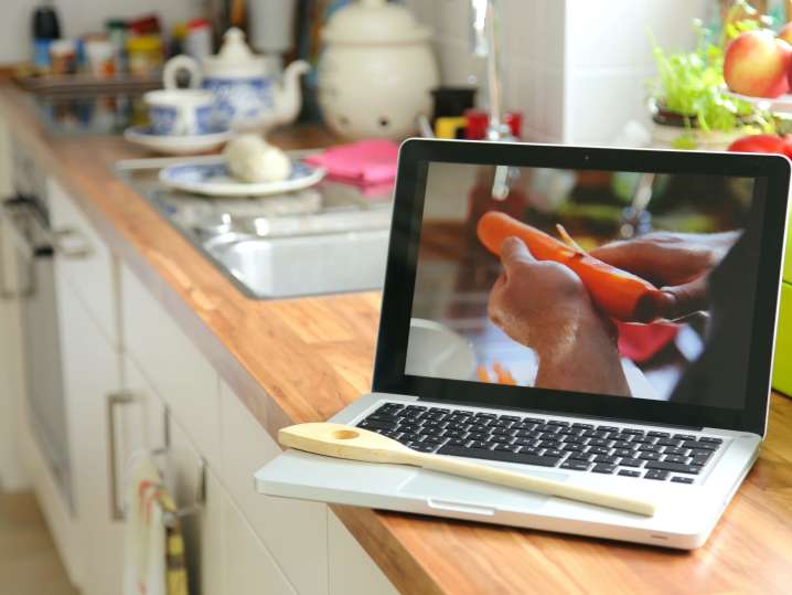 person peeling a carrot during an online cooking class | Classpop Shot