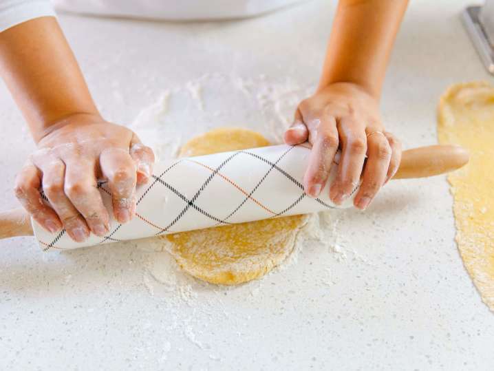 chef rolling out homemade pasta dough | Classpop Shot