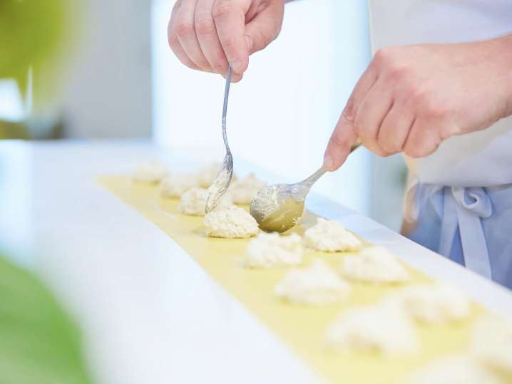 chef filling scratch made ravioli with ricotta | Classpop Shot