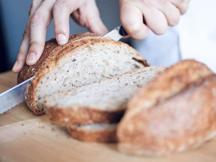 chef slicing rustic bread | Classpop Shot