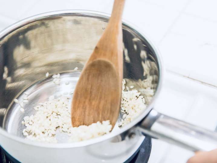 chef stirring rice for risotto | Classpop Shot