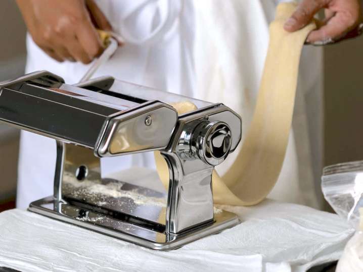 chef rolling out homemade pasta dough | Classpop Shot