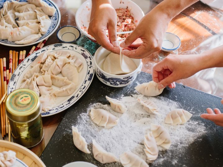 Las Vegas - group making dumplings Shot