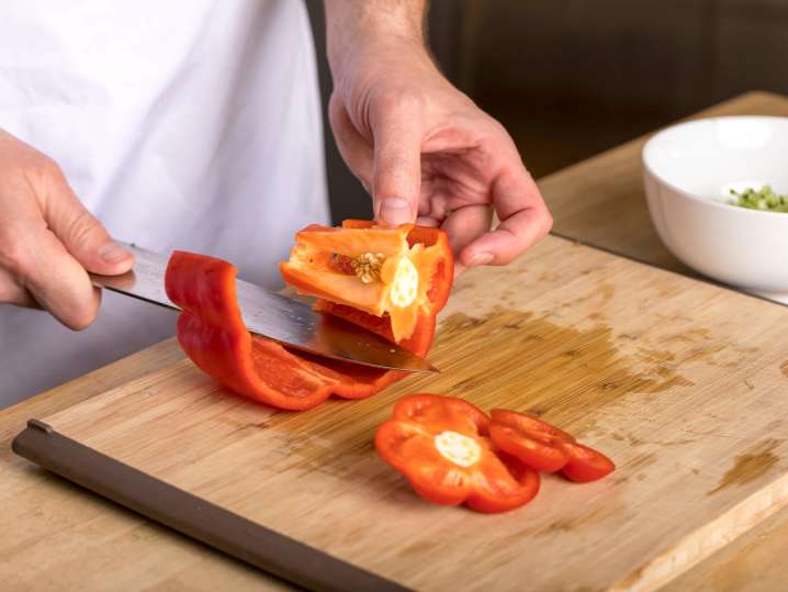 chef prepping a red pepper | Classpop Shot