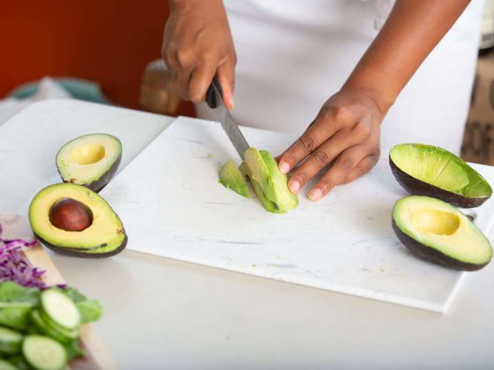 chef slicing avocados for homemade guacamole | Classpop Shot