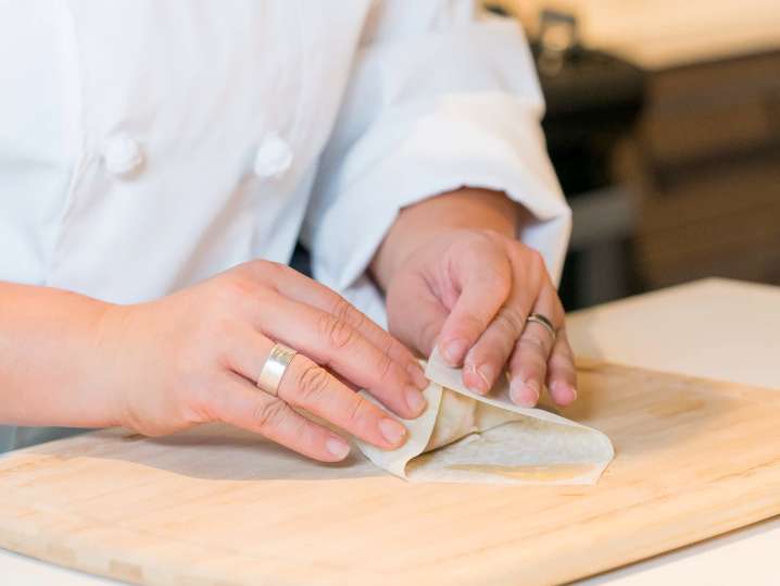 chef making lumpia rolls | Classpop Shot