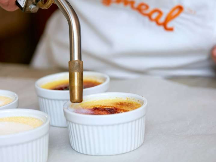 chef torching creme brulee in a cooking class | Classpop Shot