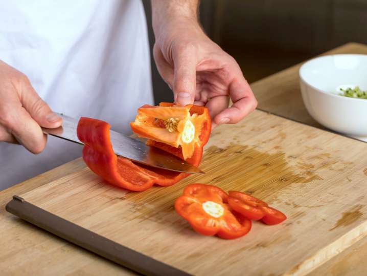 chef slicing red bell pepper | Classpop Shot