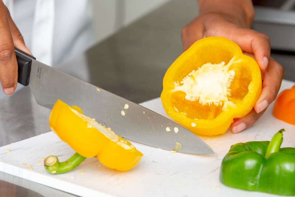 chef slicing yellow and green bell peppers | Classpop Shot 2
