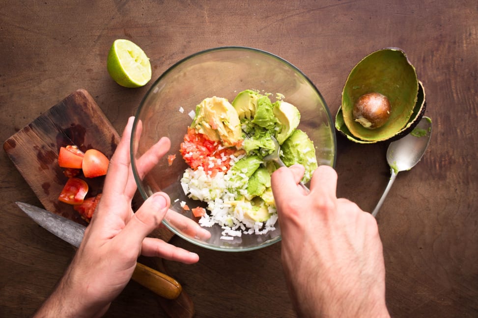 Making fresh guacamole Shot 4