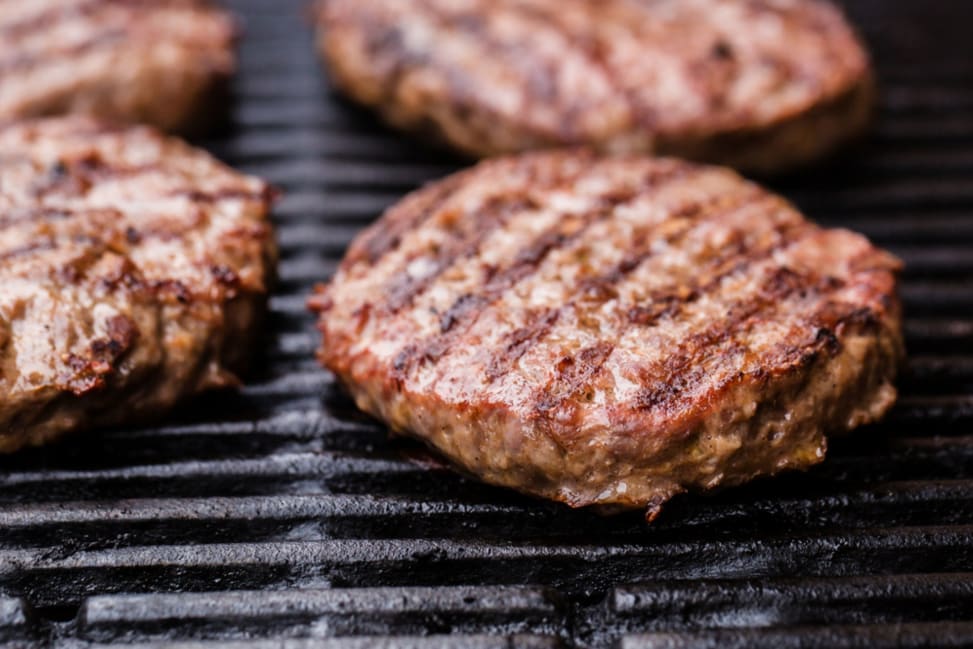 patties on a grill Shot 3