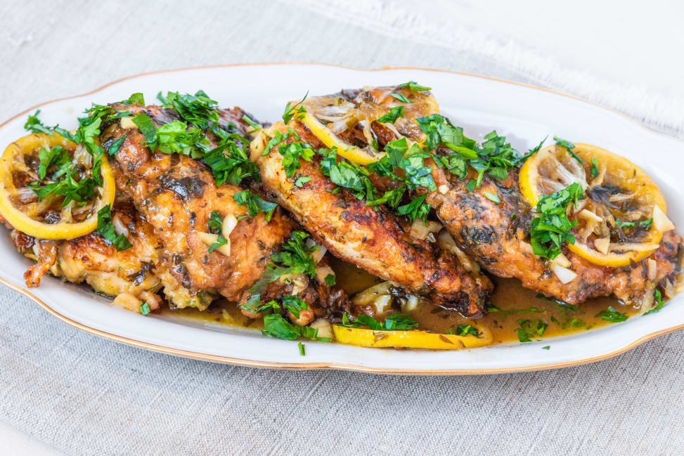 lemon and chicken on a plate Shot 4