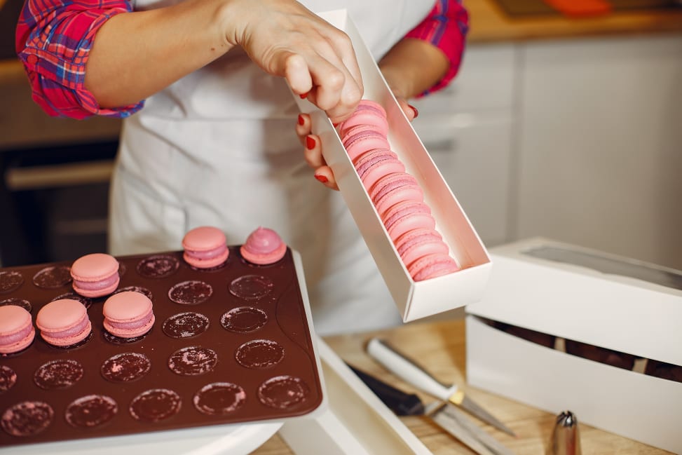 Boston - confectioner-uniform-decorates-macaroni Shot 2