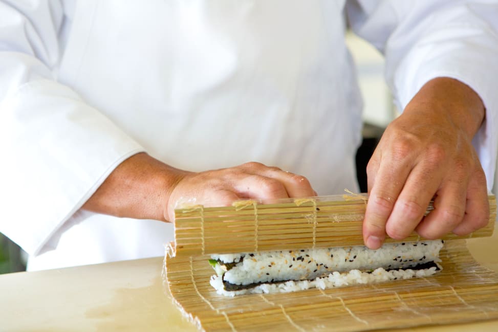 Fort Lauderdale - a chef rolling sushi in sushi class Shot 4