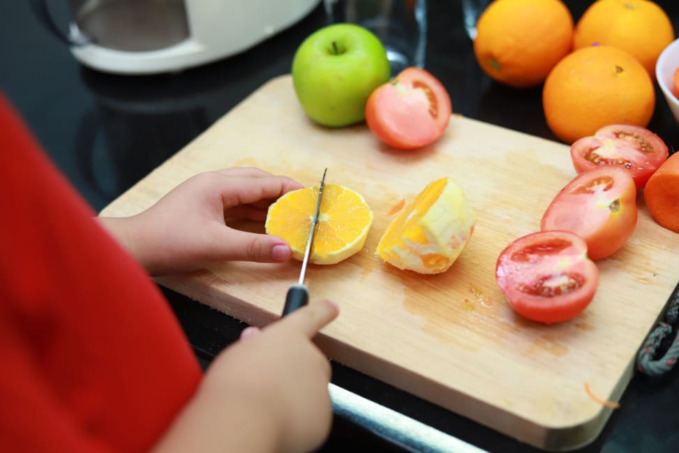 Charlotte - kids cutting fruits Shot 2