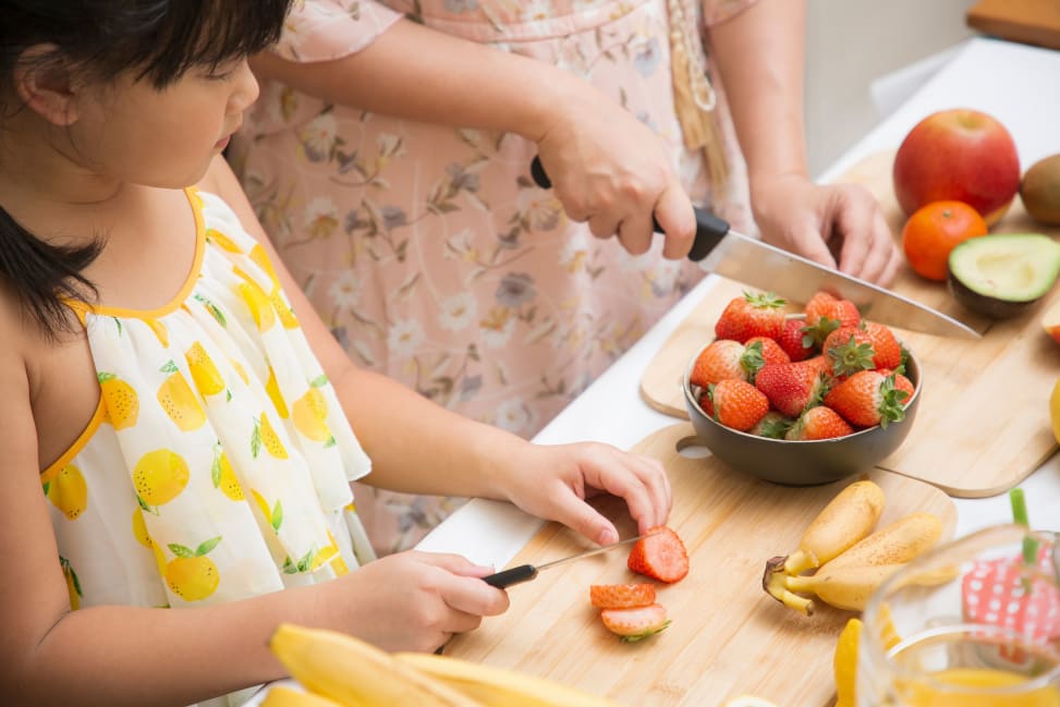 Charlotte - kid cutting strawberries Shot 3