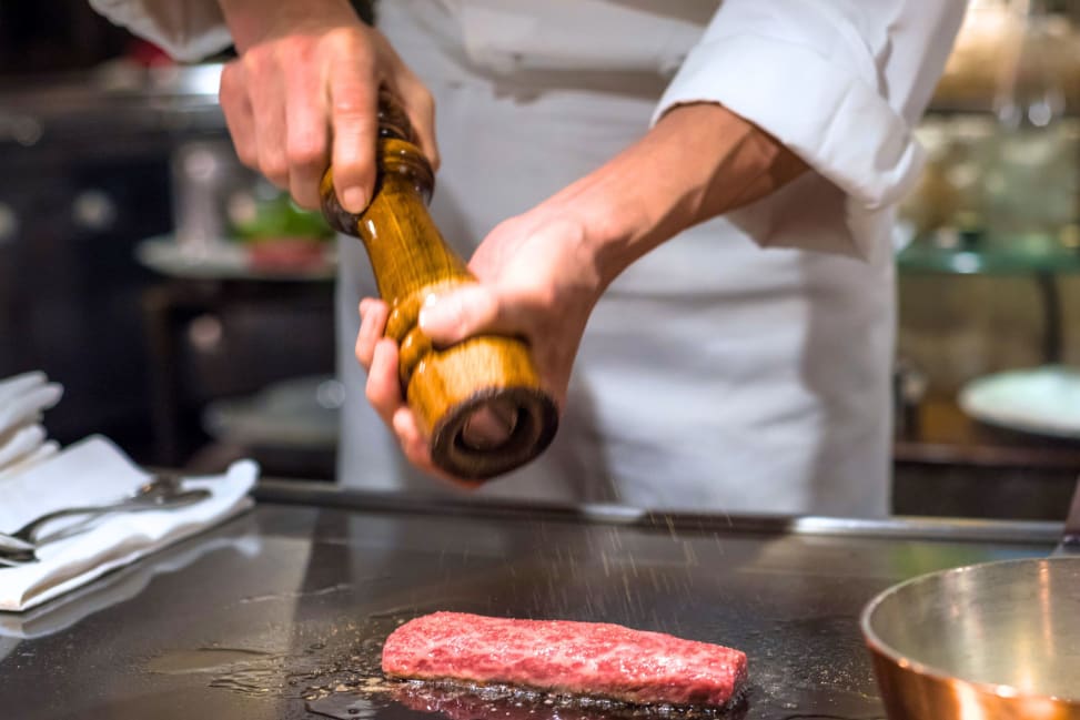 chef seasoning steak on the grill | Classpop Shot 2