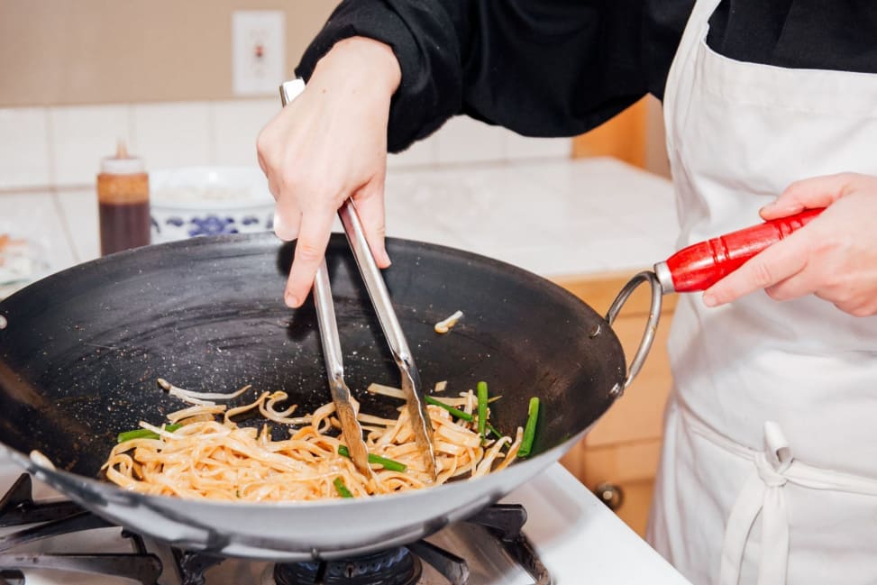 cooking vegetable pad Thai in a wok pan | Classpop Shot 2