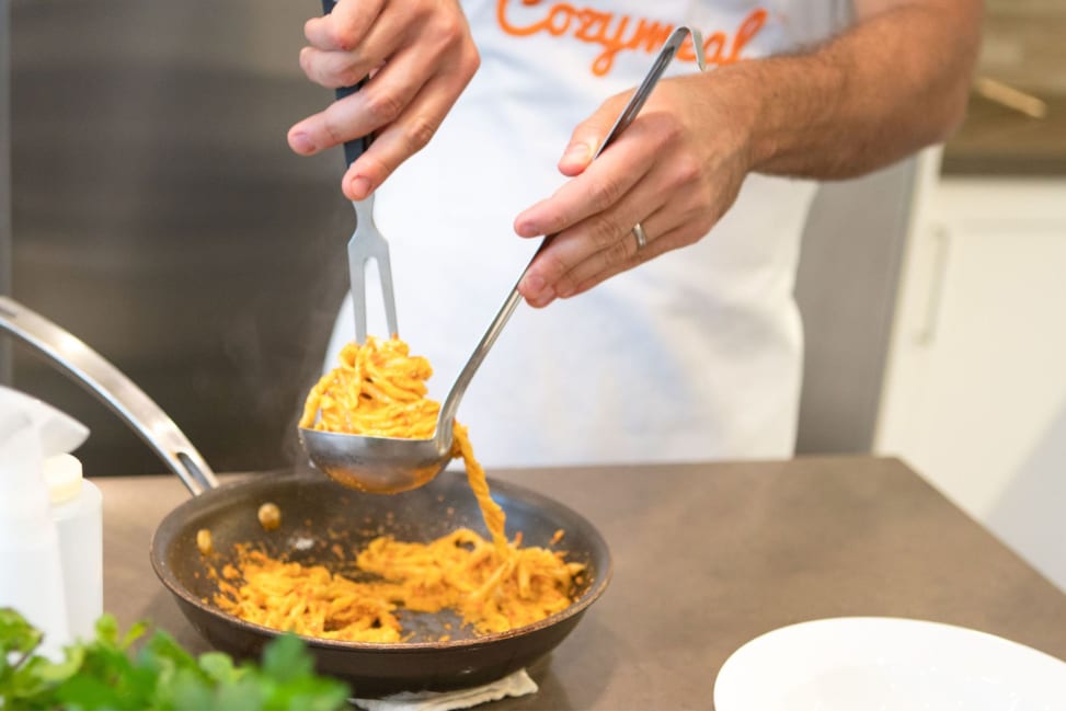 tossing fresh pasta in a creamy tomato sauce | Classpop Shot 3
