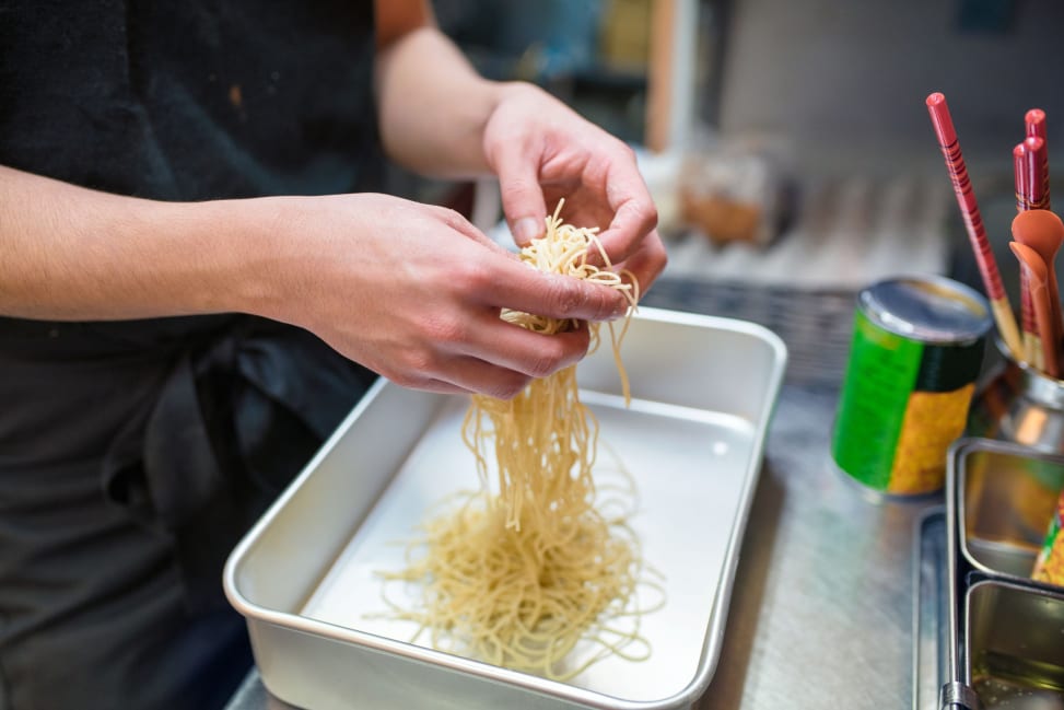 Chef portioning fresh noodles for Korean jjajangmyeon black bean noodles in a hands on cooking class | Classpop Shot 2