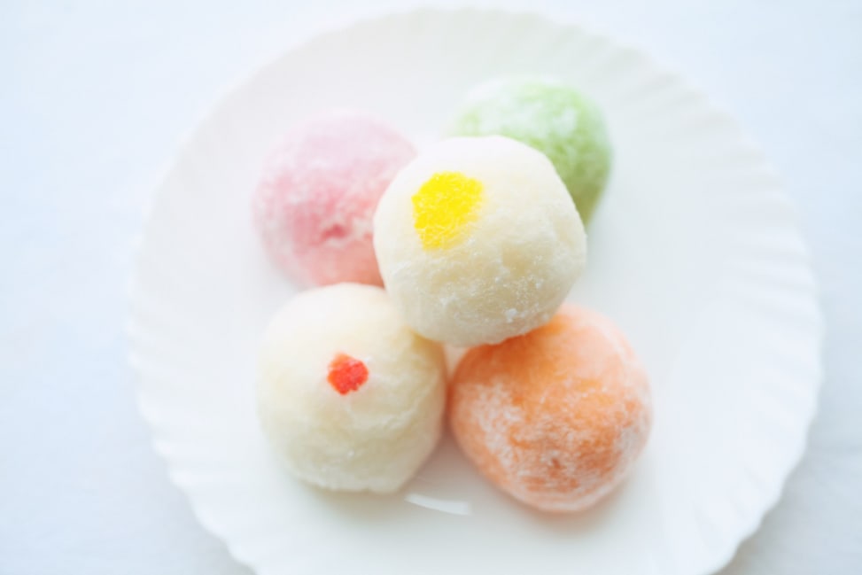 Colorful mochi ice cream in pastel flavors, served as the sweet finish to an Asian noodle cooking class | Classpop Shot 4