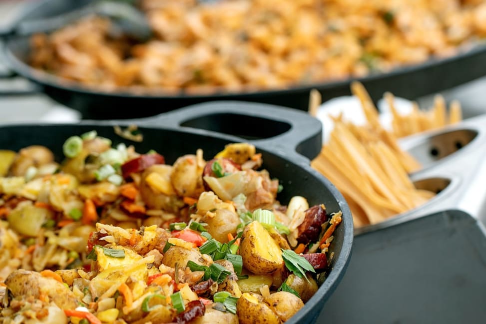 Crispy golden potato hash with peppers, onions and fresh herbs in a skillet | Classpop Shot 3