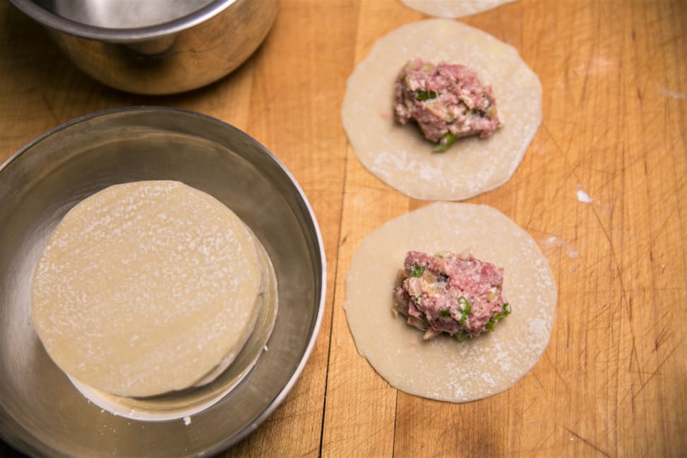wonton wrappers with pork filling to make dumplings Shot 1