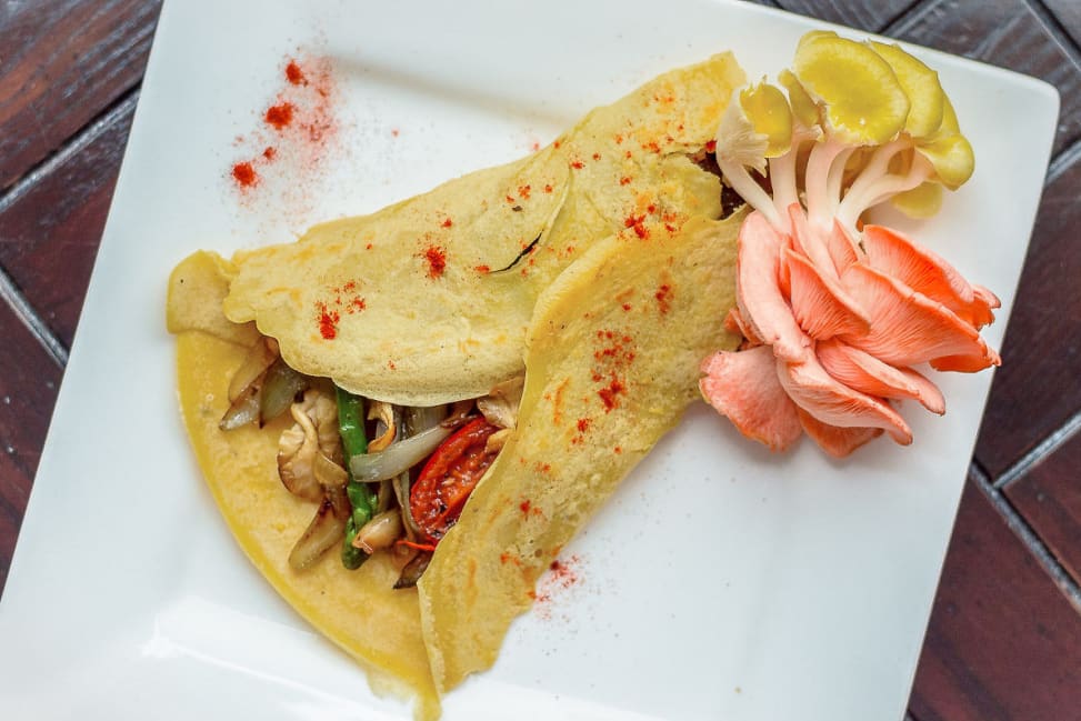 savory crepes on a plate with vegetables Shot 3