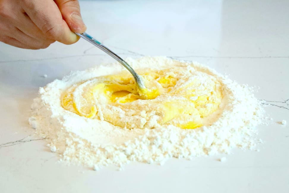 chef mixing flour and eggs to make pasta dough | Classpop Shot 2