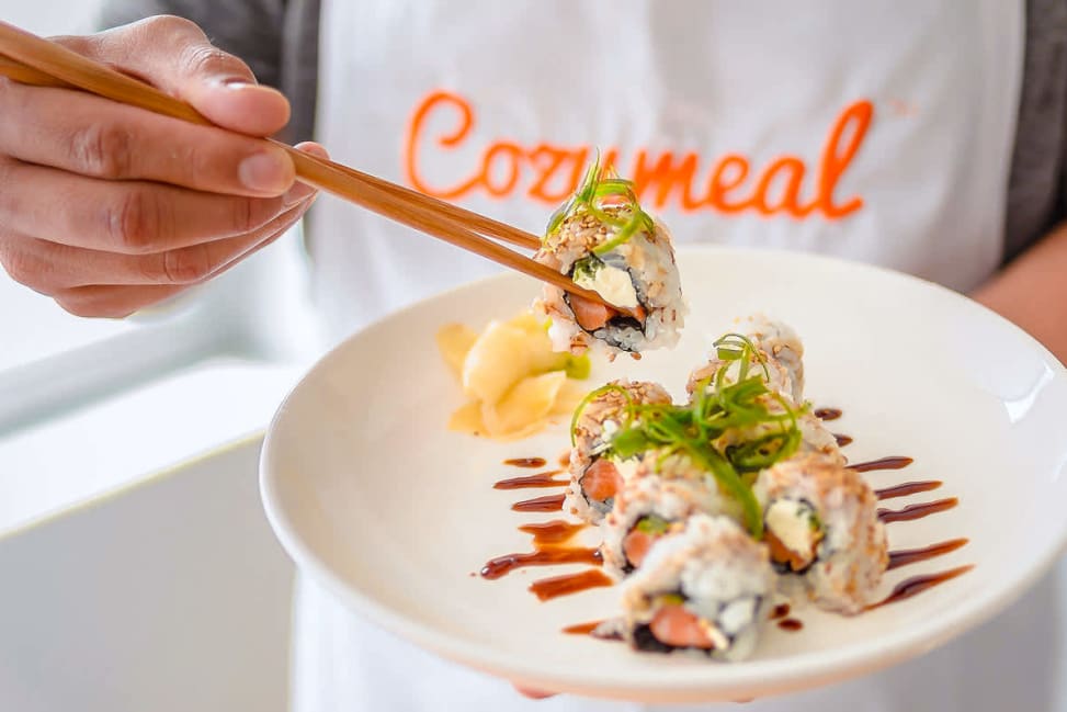 chef presenting salmon avocado roll | Classpop Shot 3