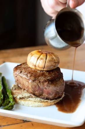 Plated steak dish from an online date night cooking class