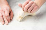 chef kneading fresh pasta dough Shot