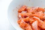 salmon in a white bowl Shot