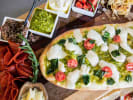 Team Building - Tour Through Italy in Denver: pistachio pesto pizza