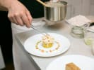 Cooking Class - Caribbean Flair in Washington, D.C.: Boiled green plantain cake with garlic, onion and pieces of conch serving