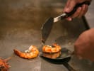 Hibachi Catering - Showstopping Hibachi Grill Fare: cooking praws on hibachi