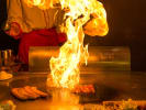 Hibachi Catering - Showstopping Hibachi Grill Fare: chef cooking with impressive fire