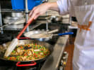 Cooking Class - Spanish Dishes for Home Cooks: cooking paella in the kitchen
