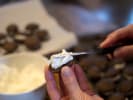 Cooking Class - The Ultimate Sweet Treats - Family Fun in Downtown Dallas: Piping marshmallow cream filling onto a chocolate cookie for whoopie pies.