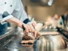 Hibachi Catering - Live Hibachi Feast: chef cooking meat on the grill