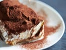 Cooking Class - Crafting Carbonara and More in Manhattan: Slice of dark chocolate tiramisu dusted with cocoa powder.