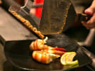 Hibachi Catering - Exclusive Hibachi Session: chef plating prawns off the grill