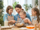 Cooking Class - Italian Cuisine for Beginners - Family Fun in Northern Virginia: mother is baking with tree young daughters in the kitchen